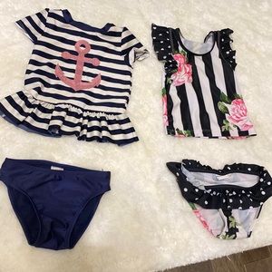 Two swimming suits for a girl plus hat